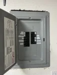 After: finished breaker panel with neatly labeled circuits — interior installation