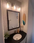 Bathroom mirror lighting installation in Los Angeles residential home